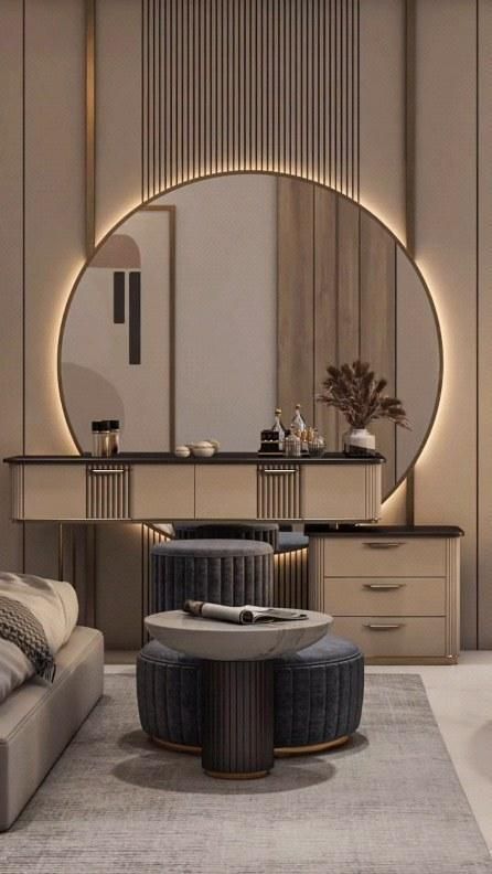 a living room filled with furniture and a round mirror