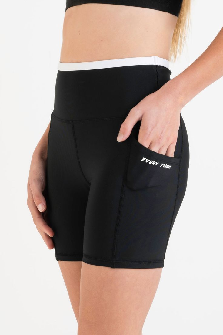 The go-to, longer length short for any workout or an off-duty look, made to move with you. Designed with a wide waistband sitting high on the waistline, double-layered for added comfort, contrast color encased top elastic ensuring no mid-action movement. Dual phone side pockets have been added on the legs to stash a card, phone or keys when on-the-go. Cut from our 4-way stretch EveryFlex fabrication that’s quick-drying and durable, made to move with you. Branded Every Turn label on the back of t Sporty Activewear With Built-in Shorts For Sports, Functional Activewear With Built-in Shorts For Workout, Compressive Athleisure Athletic Shorts With Elastic Waistband, Sporty Bottoms With Contoured Waistband, Compression Activewear With Contoured Waistband For Training, Sporty Black Biker Shorts For Yoga, High Stretch Athletic Shorts With Elastic Waistband For Workout, Compression Activewear With Waistband For Gym, Sporty Yoga Shorts With Waistband