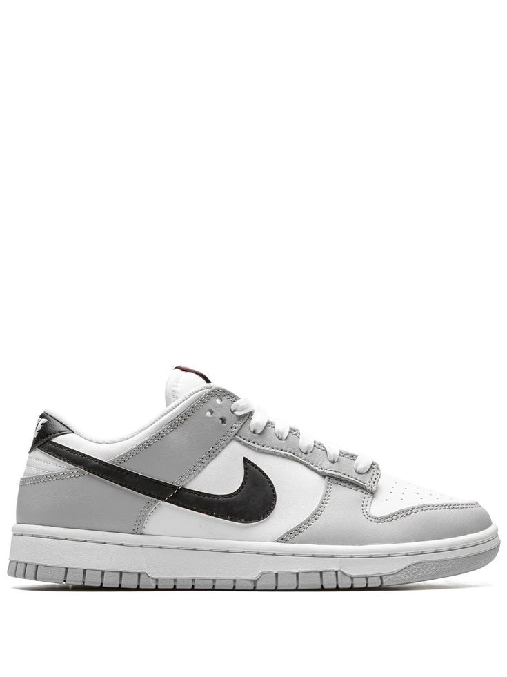 grey/white black leather signature Swoosh logo detail panelled design perforated round toe front lace-up fastening rubber sole These styles are supplied by a premium sneaker marketplace. Stocking only the most sought-after footwear, they source and curate some of the most hard to find sneakers from around the world. Nike Low Dunk Shoes, Grey Nike Sneakers, Pretty Shoes Sneakers, Fresh Sneakers, Cute Nike Shoes, Girly Shoes, Cute Nikes, Nike Air Huarache, Grey Sneakers