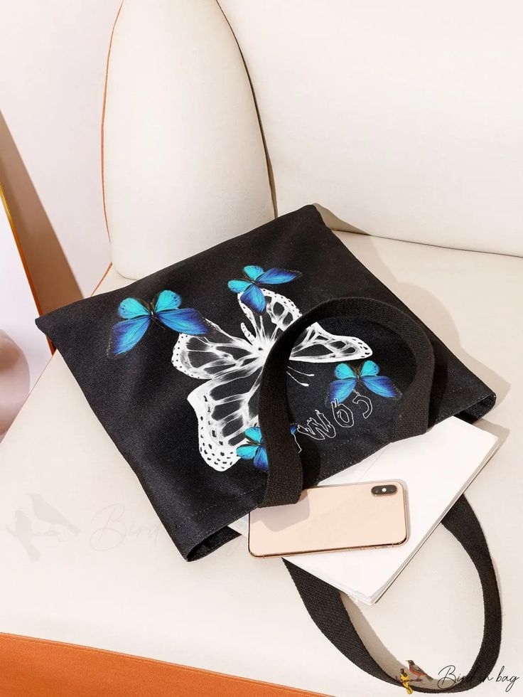 BirdinBag - Chic Butterfly Print Shopper Bag Black Hobo Tote Bag For Spring, Black Spring Hobo Shoulder Bag, Spring Black Canvas Shoulder Bag, Black Shoulder Hobo Bag For Spring, Spring Backpack For Daily Use, Casual Gift Shoulder Bag, Casual Shoulder Bag Suitable As Gift Bag, Casual Shoulder Gift Bag, Black Canvas Bag For Daily Use In Spring