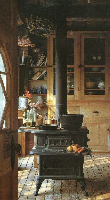 an old fashioned stove in a rustic kitchen