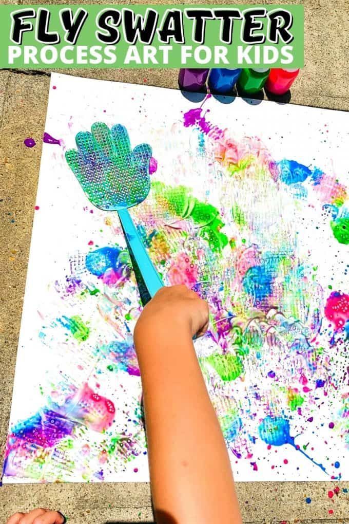 a child using scissors to paint on a piece of paper with the words, fly swatter process art for kids