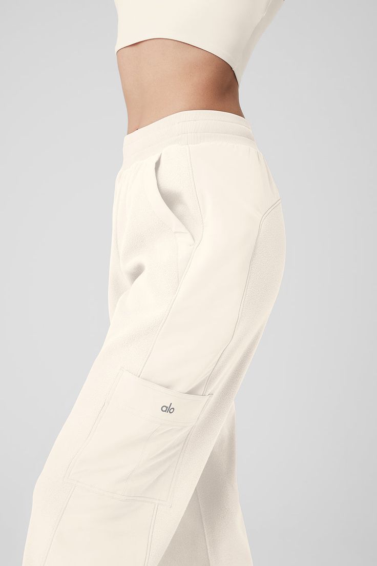 Made from a fleecy-soft fabric with smooth, contrasting panels down the legs, these pants are every bit as cozy as they look. They have a total of 4 pockets—2 on the sides, 2 on the legs—plus a stretchy high-rise waistband and stretchy cuffed hems for a jogger-style fit. Our advice? Get the matching jacket, too. Womens Onesie, Womens Capris, Fashion Joggers, Tank Top Long Sleeve, Polar Fleece, Alo Yoga, 2 On, Bra Women, Hat Hairstyles