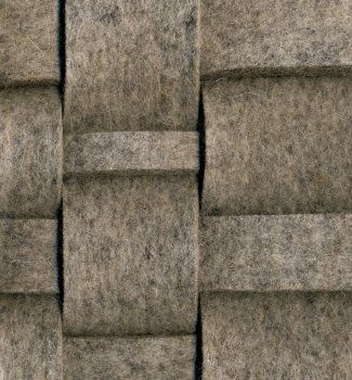 a close up view of the side of a wall made out of concrete blocks and bricks