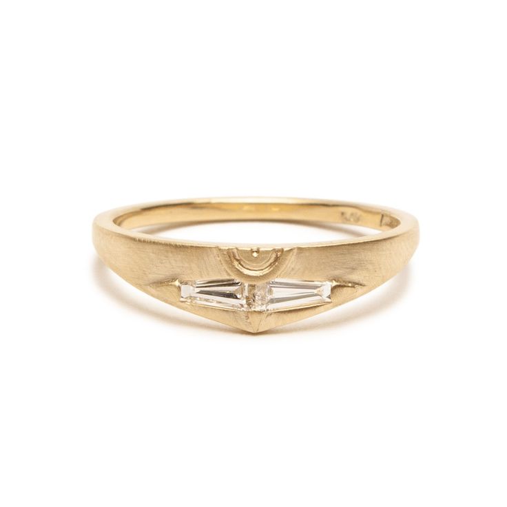 With its modern design and unusual details, the Spero diamond ring makes a great non-traditional engagement ring or diamond wedding band, or to mark a special occasion. Two sparkling tapered baguette diamonds are set in 14K yellow gold and connect to form a unique shape. Made to be matched, the Spero ring’s semicircle carving creates a full circle when paired with the Amandi Ring. Add to this set at once or at a later date by getting the Basio Ring which fits neatly next to the Spero's contoured 14k Gold Baguette-cut Diamond Ring With Bezel Setting, Traditional Engagement Rings, Soft Toothbrush, Lost Wax Casting, Baguette Diamond, Matte Gold, Perfect Ring, Diamond Wedding, Diamond Wedding Bands