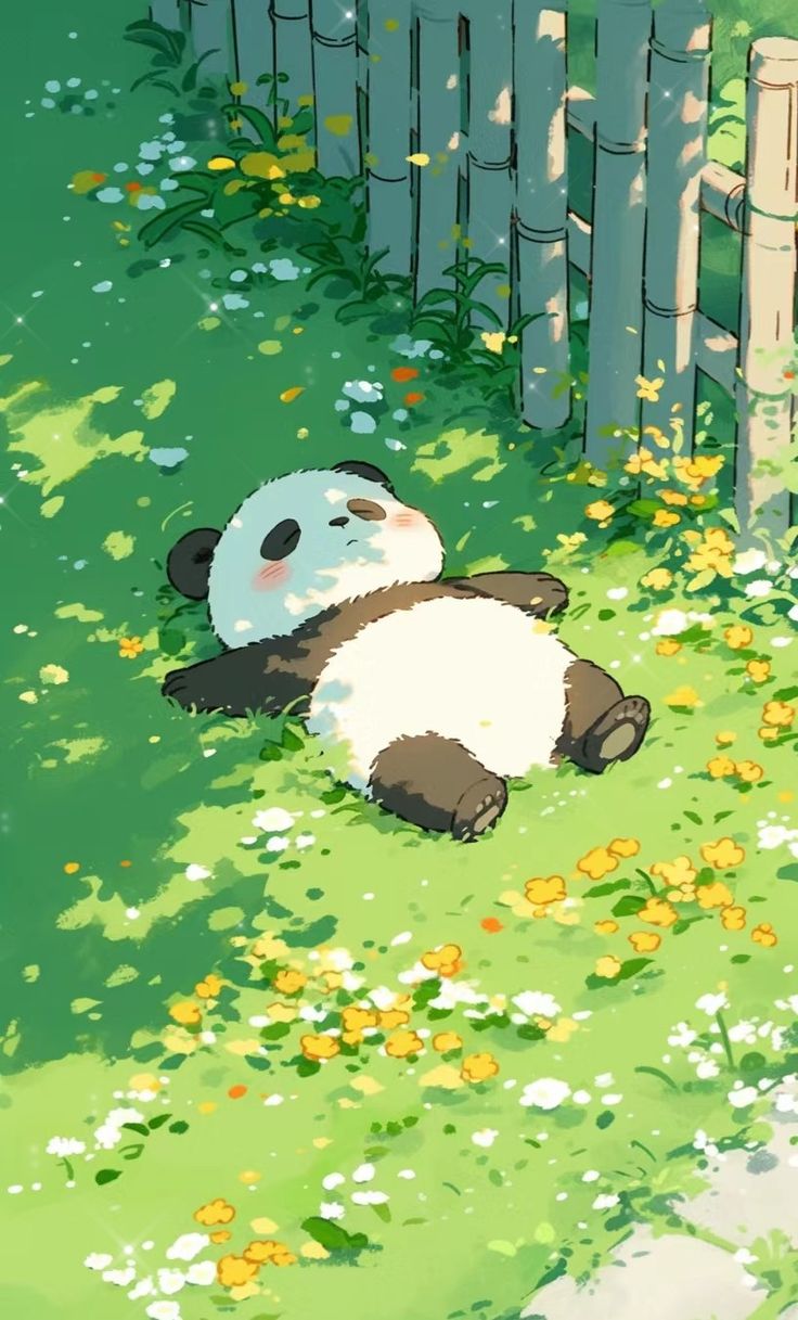 a panda bear laying on the ground next to a fence and flowers in front of it