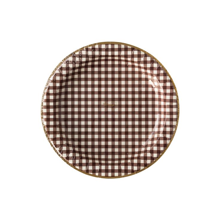 a brown and white checkered plate on a white background