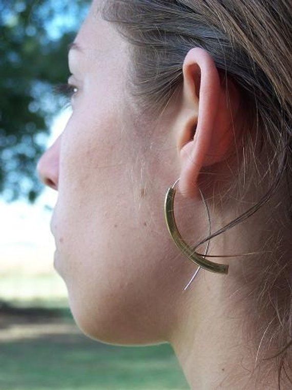 Brass and sterling silver earrings.  Simple, contemporary, minimal, beautiful.  This is a medium version of the copper minimalist earrings.  If you have seen them but are not comfortable wearing 3" earrings, then these are just for you. Tiny 1 1/4" version also available in my shop (check listings).2" long.  These are a medium size and comfortable. You'll love them. Contemporary Everyday Jewelry With Ear Wire, Modern Brass Wrap Earrings, Modern Hammered Earrings For Everyday, Modern Nickel-free Wrap Earrings For Everyday Wear, Modern Nickel-free Wrap Earrings For Everyday, Modern Nickel-free Threader Earrings, Silver Earrings Simple, 3 Earrings, Minimal Earrings