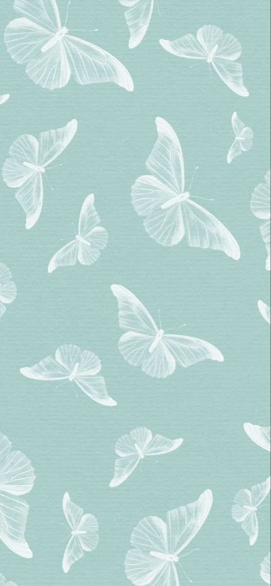 a blue and white wallpaper with butterflies on it