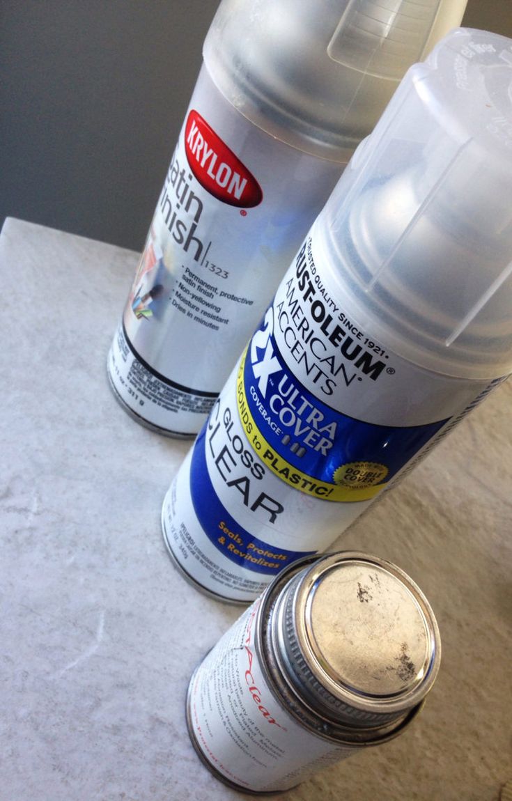 three different types of deodorant sitting on a counter