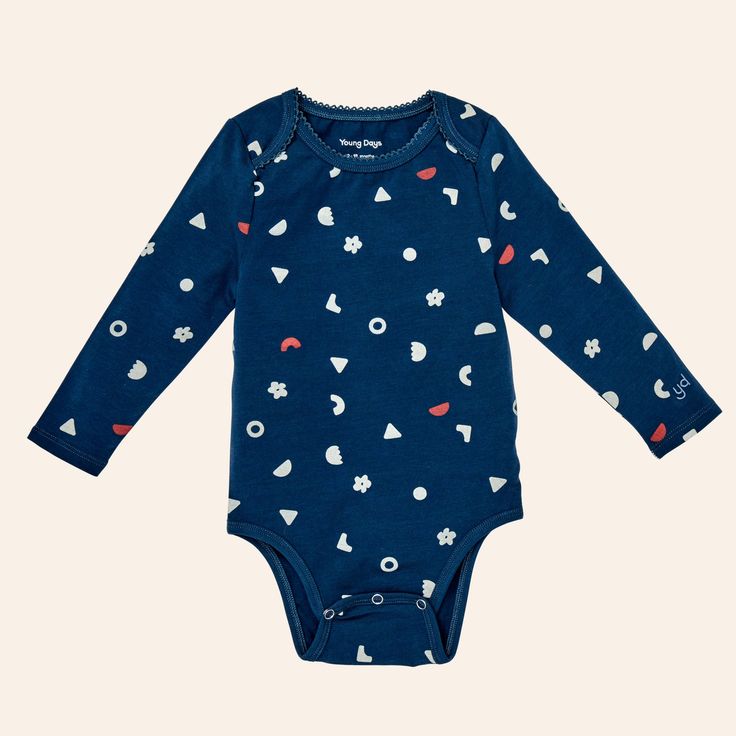 It may look like a basic onesie, but this one is slightly more elevated. Made in the softest organic cotton with spandex and featuring a fashionable trim at the neck and yoke as well as our YD embroidery at the sleeve. It comes in an array of adorable prints that can be worn out and about or can be worn to bed. The onesie also features easy to close snaps so you’re never stuck at the changing table. 95% Organic Cotton, 5% Spandex Survivor Kit, Casual Design, Out And About, Sustainable Fabrics, Product Label, New Parents, Easy Wear, Changing Table, Design Details