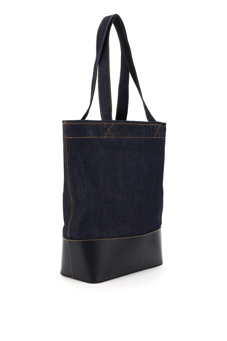 Base: 100% Leather Product: 98% Cotton, 2% Polyurethane | A. P.C. Men's Axelle Denim Tote Bag in Blue | SS24 Jean Touitou, Craft Tote Bag, Denim Tote Bags, Denim Tote, Japanese Denim, Dark Navy Blue, Roberto Cavalli, Long Handles, Luxury Retail