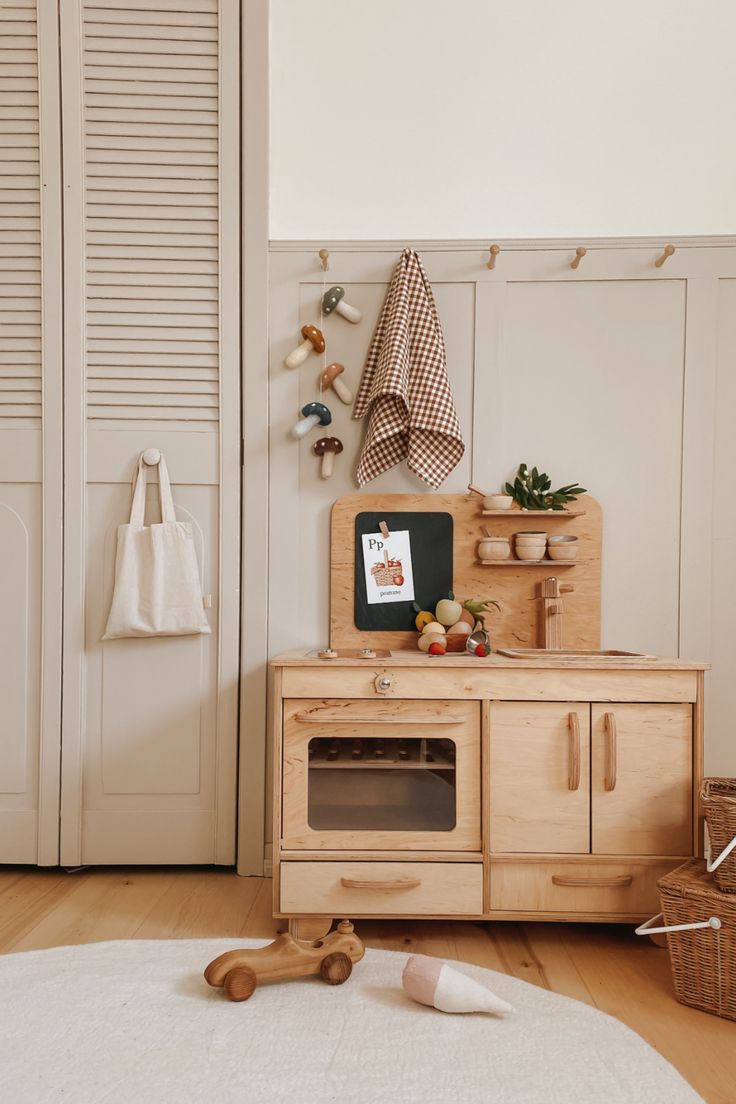 a wooden cabinet sitting on top of a hard wood floor next to a white rug