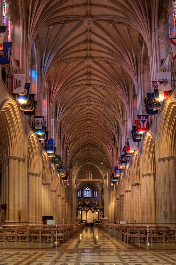 the inside of a large cathedral with high vaulted ceilings