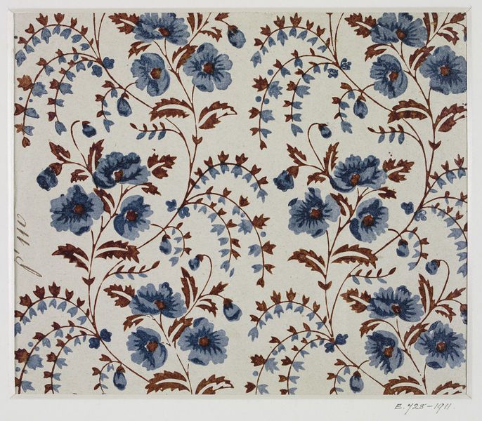 a blue and brown floral design on white paper