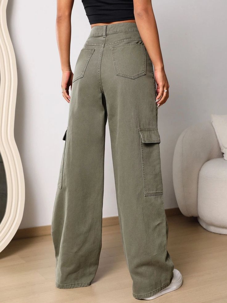 Make a bold style statement with our Flap Pocket Wide Length Jeans in an eye-catching green color. Designed with a plain pattern and wide-leg silhouette, these cargo pants-inspired jeans are a must-have for fashion enthusiasts. The zipper fly closure and natural waistline ensure a secure and comfortable fit. Details: Color: Green Pattern Type: Plain Type: Wide Leg Jeans Style: Cargo Pants Closure Type: Zipper Fly Waist Line: Natural Length: Long Fit Type: Loose Fabric: Non-Stretch Material: Deni Green High Waist Wide Leg Pants With Pockets, Trendy Wide Leg Cargo Pants For Fall, Trendy Baggy Green Wide Leg Pants, Trendy Wide Leg Non-stretch Cargo Jeans, Trendy Full Length Cargo Jeans, Trendy Green Baggy Wide Leg Pants, Non-stretch Trendy Full Length Cargo Jeans, Spring Khaki Cargo Jeans With Side Pockets, Green Utility Style Wide Leg Pants