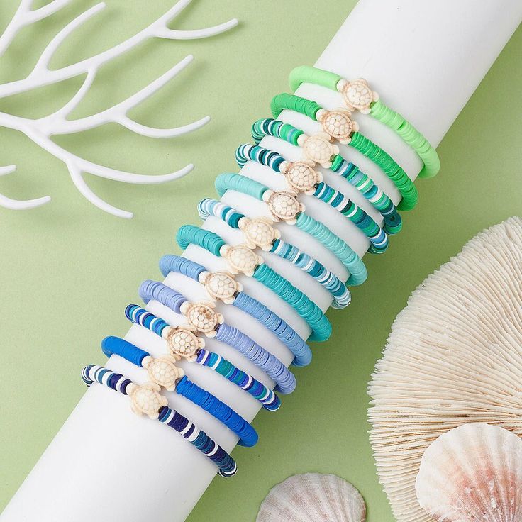 NEW~ Description 12pcs/set. Product Category: Bracelets Description: 12Pcs  12 Color Polymer Clay Heishi Surfer Stretch Bracelets Set LOT Dyed Synthetic Turquoise Sea Turtle Stackable Bracelets,  AS PICTURED! Mixed Color Stretch Size: about 2~2-1/8 inch(5~5.25cm) inner diameter, 6.5~14mm wide, Please feel free to contact me with any questions or concerns, I'll be willing to help in any way. SHIPPING: Standard first class shipping takes 3-5 business days. I am not responsible for missing/stolen packages or packages that have been marked as "delivered" via USPS. Please make sure you have the correct shipping address. Please feel free to contact me with any questions or concerns. Please check back often as I'm frequently creating and adding new Items.... Polymer Clay Rings, Polymer Clay Ring, Clay Rings, Tanah Liat, Rings Handmade, Clay Bracelet, Turtle Charm, Styl Boho, Stackable Bracelets