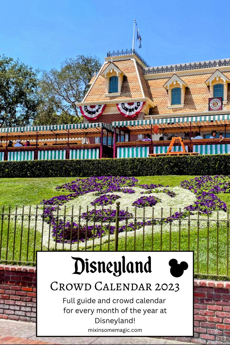 disneyland's crowd calendar 2012 is displayed in front of the entrance to its theme park