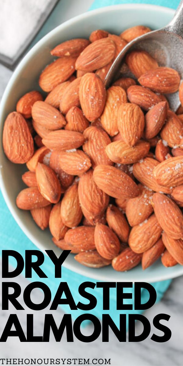 almonds in a bowl with the words dry roasted almonds