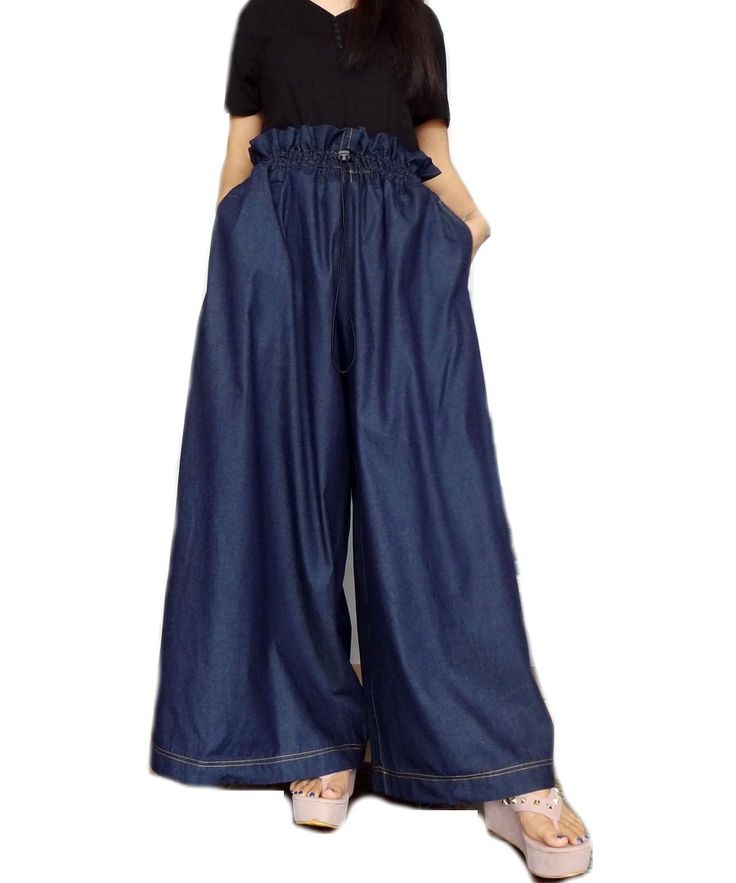 Get ready to fall in love with our unique Wide Legs Pants! Made from high-quality cotton denim fabric, these pants feature a comfortable ruffle style design that fits most sizes. We design for every body who falls in love with the loose and comfy fit. Our collection is a limited run, so get a few of these now! Measurement: Waist/Hip: Maximum 52" (Elastic Drawstring) Crotch: 15" 39 cm. Length (Outseam): 41" 105 cm. Has 2 Pockets. Model Details: Model is about a size US 8. Waist: 28" - 71.12 cm. Hips: 37" - 93 cm. Height: 5' 6" 158 cm Tall. About This New Collection You will not only look "Great" but you will feel "Fantastic" showing these off anywhere you go. This collection is a limited run, so get a few of these now! We will begin to add some exciting styles as time permits to keep you lo Pants Unique, Wide Legs Pants, Long Skirt Casual, Bustle Skirt, Balloon Pants, Khaki Skirt, Bright Fashion, Ruffles Fashion, Womens Pants