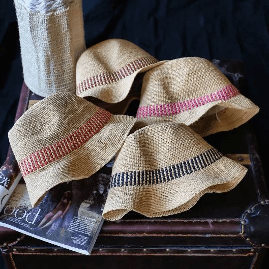 We take pride in the craftsmanship that goes into every Unisex Raffia Straw Fedora. Meticulously handwoven by skilled artisans, the premium raffia straw lends a unique, textured finish that’s both visually appealing and comfortable to wear. The robust construction ensures your Fedora retains its pristine condition over time, promising a durable accessory that doesn’t compromise on styleAn ideal gift for her!Specifications-Material: 100% raffia straw-Size: Head size 55-59 cm -Brim:5 cm-Height:10c