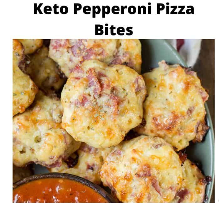 keto pepperoni pizza bites in a bowl with dipping sauce on the side and text overlay