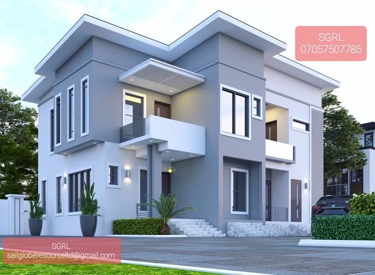 a two story house with balconies on the second floor