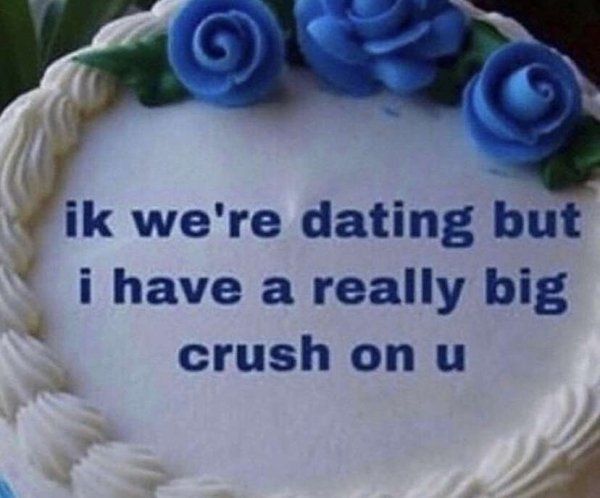 a cake with blue roses on it that says, if we're dating but i have a really big crush on u