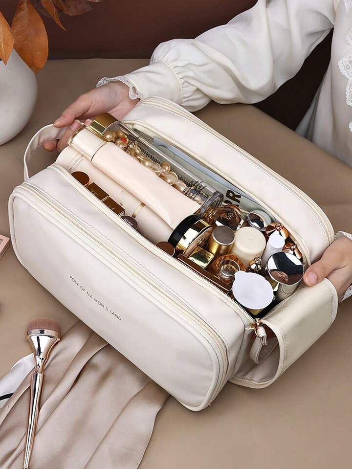 a woman is holding a white bag filled with cosmetics