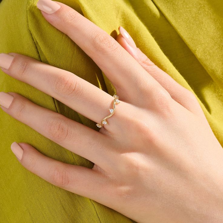 Ride the wave of style with our Constellation Wave Ring. The intricate design flows like a cosmic current, symbolizing strength and fluidity. Crafted in radiant gold, this ring embodies a blend of modern charm and timeless sophistication, making it a perfect statement piece for any occasion. - Made in 14k solid gold - Decorated with handset white cubic zirconia stone - Band Width: 3.73 mm / 0.14 inches - Thickness: 1.10 mm / 0.04 inches - This product comes with an iconic Norm Jewels gift box Ride The Wave, Luxury Jewelry Brands, Wave Ring, Gold Sun, Pear Engagement Ring, Twist Ring, Knot Ring, Gold Piece, Vintage Band