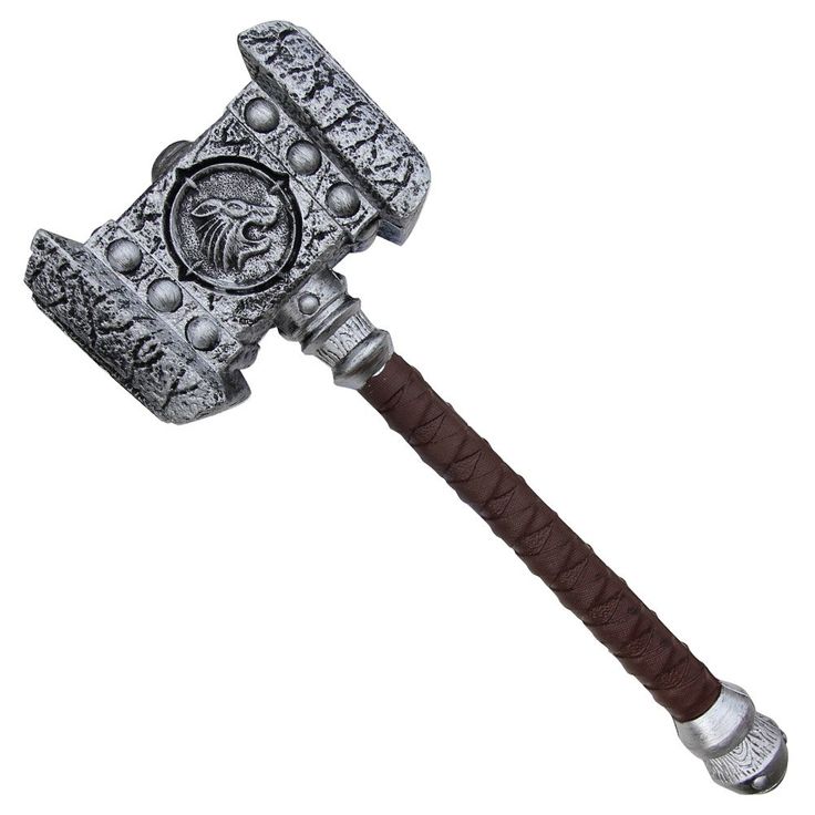 an old style hammer with intricate carvings on it