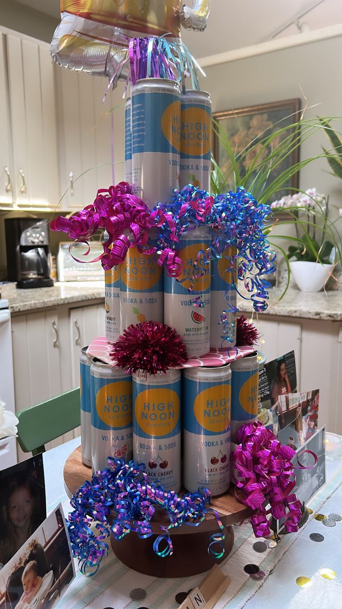 a cake made out of cans and flowers