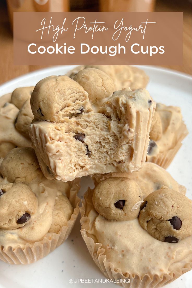 some cookies are stacked on top of each other with the words high protein yogurt cookie dough cups