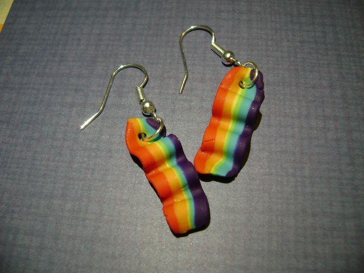 Rainbow Bacon Earrings Bacon measures approximately between 1.5cm to 2.25cm Materials: ▫ Polymer Clay ▫ Hypoallergenic Hanging Earring Hook Each bacon is handmade by me, so you may receive a pair of earrings that are slightly different from the ones pictured in the listing. As they are all made by hand all are similar but no two pairs will ever be the same! I can also do custom orders. Please feel free to send me a message with any questions or ideas! Thanks for checking out my shop! Adjustable Rainbow Earrings As Gift, Rainbow Hoop Earrings With Ear Wire For Gift, Rainbow Hoop Earrings With Ear Wire As Gift, Rainbow Single Earring As Gift, Single Rainbow Earring For Gift, Rainbow Nickel-free Earrings For Gifts, Nickel-free Rainbow Earrings Gift, Nickel-free Rainbow Earrings For Gift, Rainbow Hypoallergenic Earrings As Gift