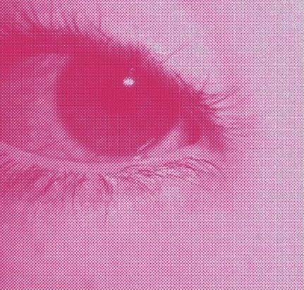 an eye is shown in pink and white