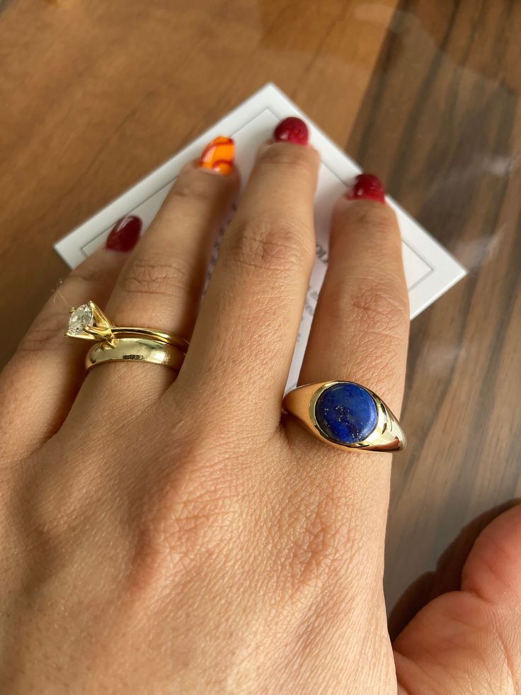 This 14k Solid Gold Lapis Ring is made of real gold . There is a real, round Lapis Lazuli stone setted on this ring.  This blue stone pinky ring is looking very cool both on man and woman pinky. You can also wear this gold and navy color gemstone ring on your other fingers, very comfortable and solid.  Choose your gold color from color options section.  This round lapis signet ring will be sent with signed certificate of authenticity. Ring size on pictures is 9 US and weight is 6,59 gr. Weight w Gold Plated Blue Rings As Gift, Blue Gold Plated Rings As Gift, Blue Gold Plated Rings For Gift, Blue Gold-plated Rings For Gifts, Oval Blue Signet Ring In 14k Gold, Blue 14k Gold Signet Ring With Gemstone, Gemstone Signet Ring With Round Band As A Gift, Sapphire 14k Gold Signet Ring Gift, 14k Gold Sapphire Signet Ring As Gift