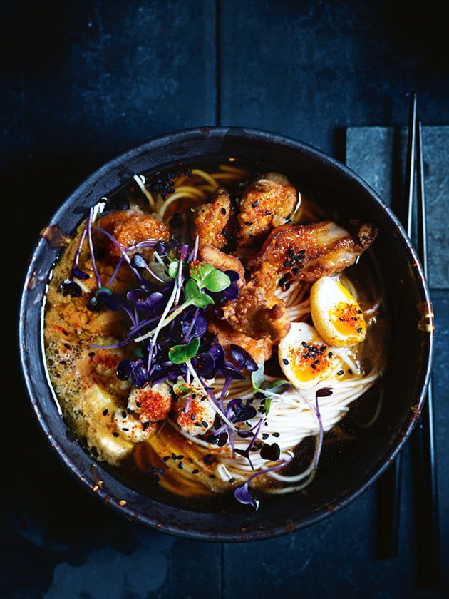 a bowl filled with food on top of a table