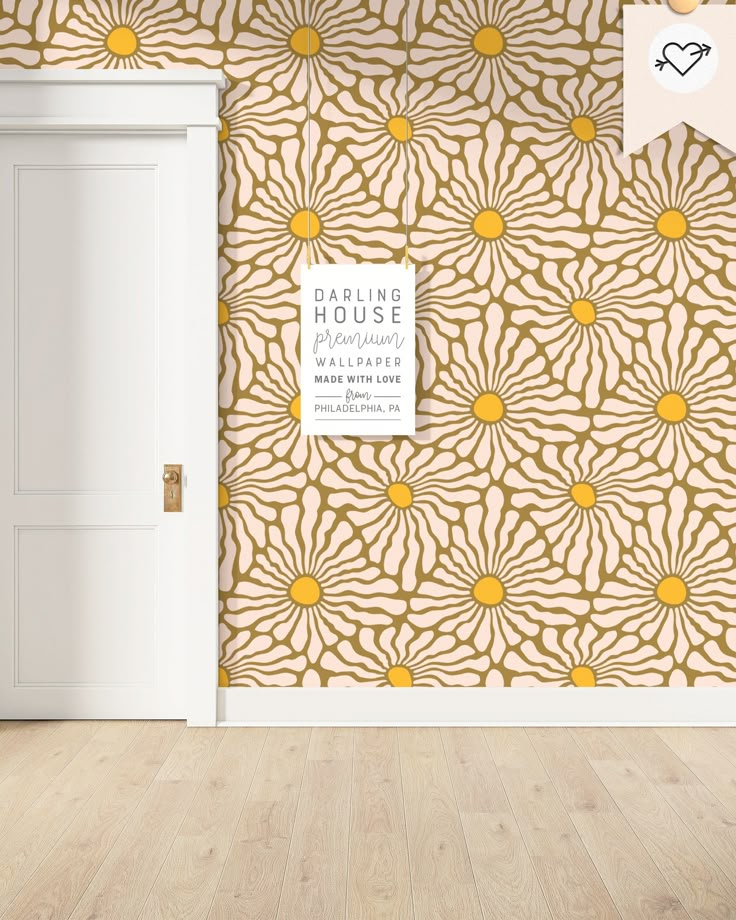 an open door in front of a wallpapered room with yellow and white flowers