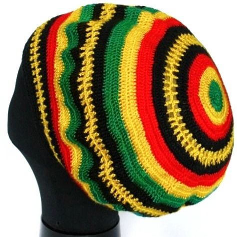 a multicolored knitted hat on a black mannequin head