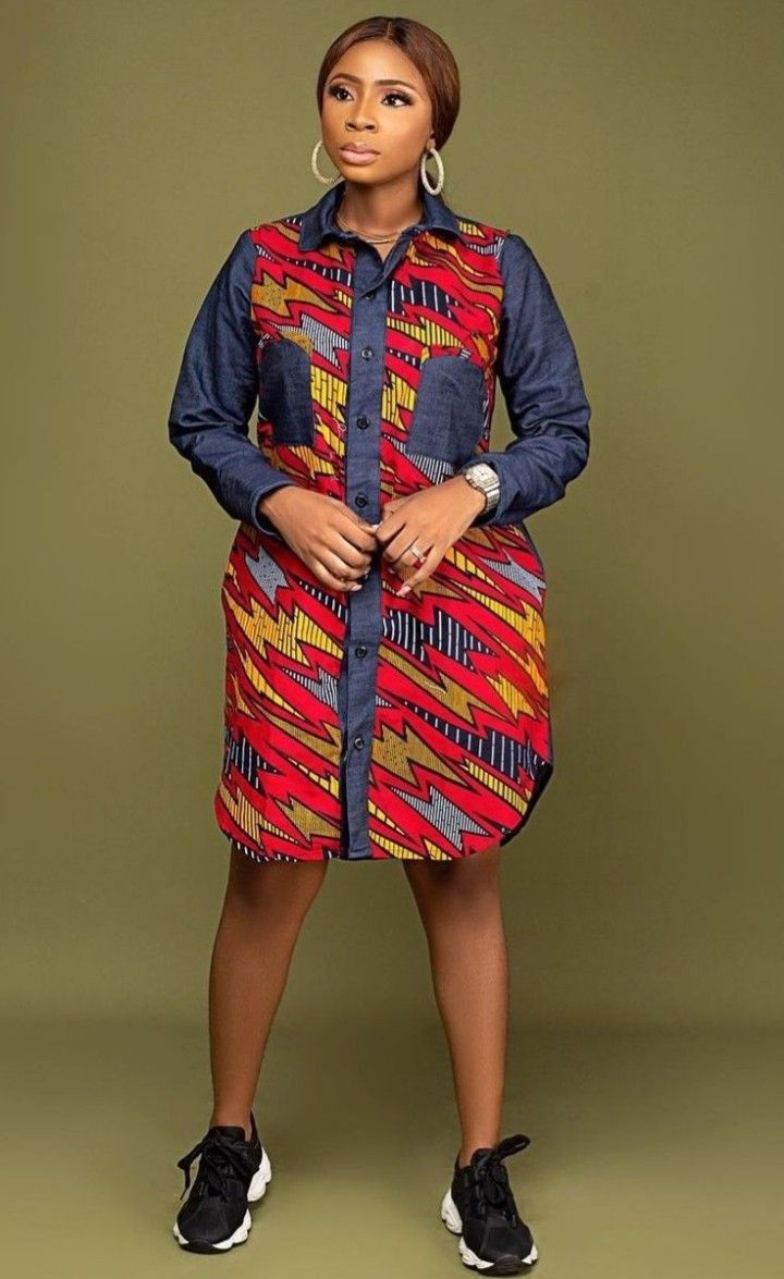 Ankara short flare gown with sneakers Short Flare Gown, Ankara Short Flare Gowns, Ankara Shirt Dress, African Shirt Dress, Ankara Shirt, African Print Shirt, African Print Dress Ankara, Short African Dresses, African Fashion Skirts