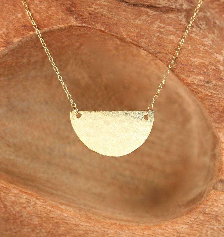 Half circle necklace, gold disc necklace, half moon necklace, minimalist, a gold vermeil semi circle hanging from a 14k gold filled chain A simple and classy, hammered gold vermeil semi circle hanging from a 14k gold filled chain in the length of your choice. Perfect for layering! Pendant Measurements: 27mm x 15mm. ♥ Handmade with love in sunny California ♥ This gem will arrive happily in a gift pouch or box More from BubuRuby? https://www.etsy.com/shop/BubuRuby?ref=hdr_shop_menu More charm neck Half Moon Necklace, Gold Disc Necklace, Gold Circle Necklace, Sunny California, Gold Disc, Hammered Gold, Necklace Minimalist, Art Clay, Half Circle