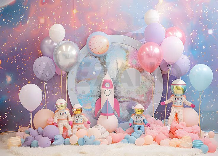 an astronaut themed birthday party with balloons and decorations