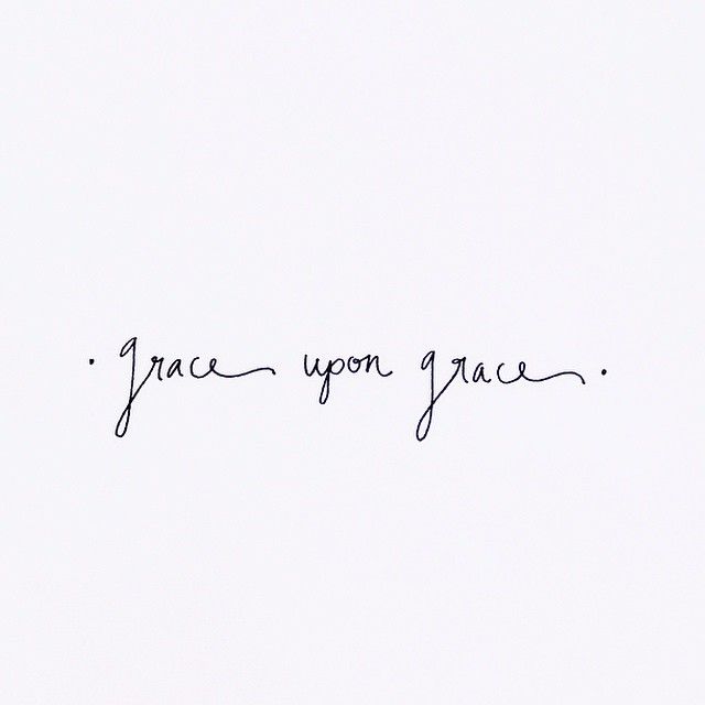 the words grace upon grace written in cursive handwriting on a plain white paper