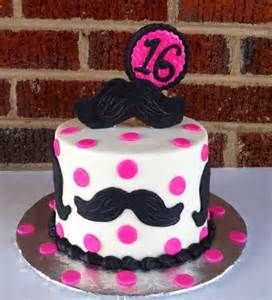 a birthday cake decorated with pink and black polka dots, the number twenty five on top