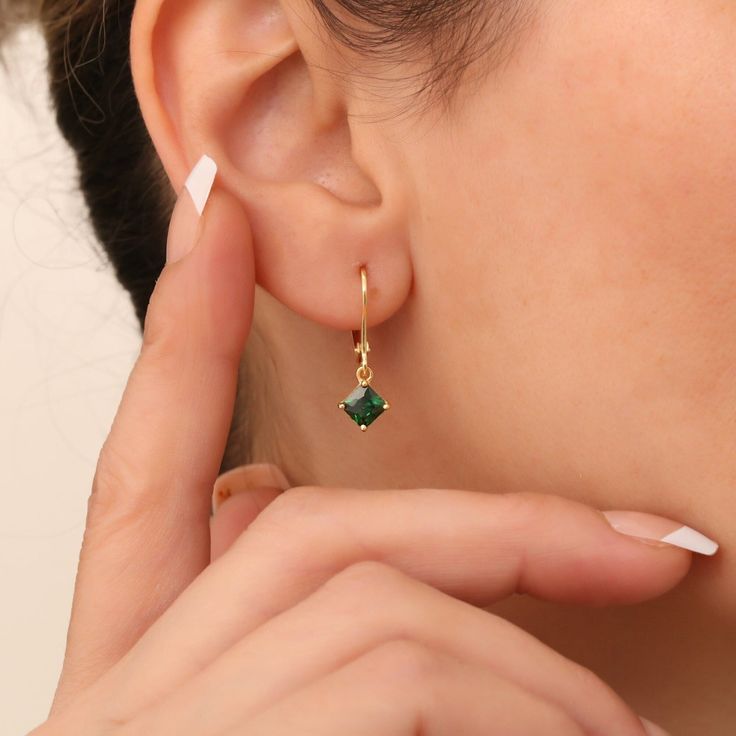 Emerald is known as the stone of love and loyalty, it contributes to the development of emotional bonds. Our 14K Solid Gold elegantly designed emerald earrings are suitable for daily use and are stylish jewelry that you can use on your special days. Make yourself and your loved ones happy by buying gifts. The birthstone of those born in May is Emerald. F E A T U R E S * Sold as Single or Pair. * Made to order. * Gold KT: 14K * Gold Color Selection: Yellow Gold, Rose Gold, White Gold * Emerald Carat: One earring 0.50ct. * Earring Lenght: 23.30 mm / 0.92 inch * Earring Width:    5.50 mm / 0.22 inch * Ready to Ship in 1-3 Business Days * 100% USA sourced * 2 years warranty * Free Express International Shipping * Free returns within 14 days from order date Our necklace compatible with our earr Birthstone Earrings, May Birthstone, Birthstone Earring, Emerald Earrings, Square Earrings, Lovely Jewellery, Stylish Jewelry, Buying Gifts, Mother Day Gifts