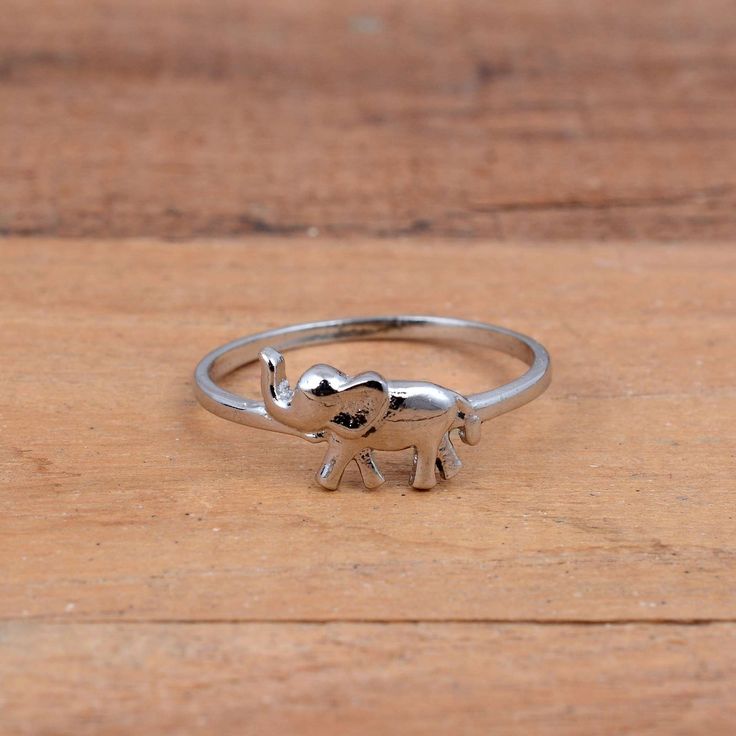 Cute Elephant Ring, Solid 925 Sterling Silver Elephant ring, Dainty Elephant Rings, fashion Animal Ring, Wedding/Engagement/Birthday Gifts Dimension :- JEWELRY CATEGORY:- HANDMADE RING METAL: - STERLING SILVER RING SIZE:- ALL SIZES AVAILABLE PURTY:- 925  Shipping:- All the parcels will be shipped with in 1-2 days of purchase... Payment:- We accept payment through PAYPAL only.... I make every effort to picture each item as realistic as I can but colors can be slightly different due to screen cali Elephant Rings Silver, Nickel-free Fine Jewelry Rings For Anniversary, Anniversary Nickel-free Fine Jewelry Rings, Fine Jewelry Nickel-free Promise Ring, Nickel Free Fine Jewelry Promise Ring, Elegant Silver Rings For Birthday, White Gold Nickel-free Rings For Promise, Silver Stackable Rings As Gift, Silver Stackable Rings Gift