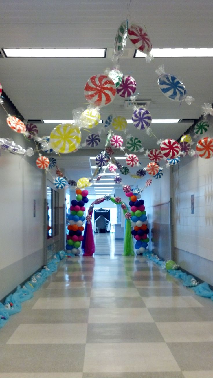 the hallway is decorated with candy and lollipops for an entrance to a school