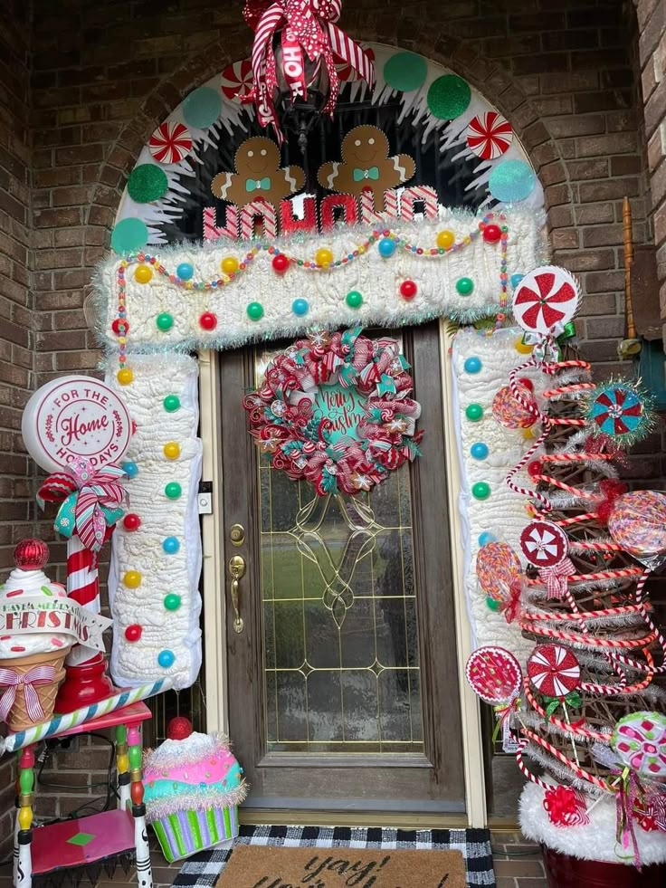 a front door decorated with candy and decorations