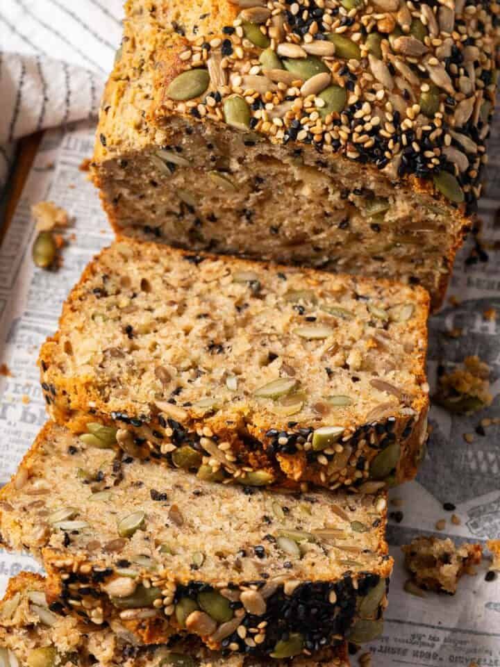 sliced loaf of bread with seeds on top