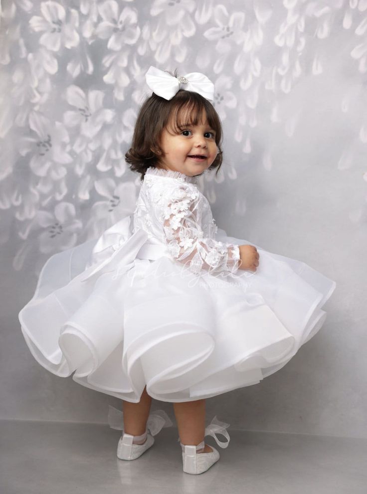 Baby white dress or ivory dress for first communion, baptism dress or first birthday - for any official celebration. A combination of a fluffy lower multi-layered skirt made of delicate tulle and a skirt top made of light flowing organza, a dress top made of voluminous lace with a small ruffle along the neckline. The dress is very interesting and stylish, like a light angelic cloud, in which the baby will look like a real pure and gentle angel The dress is available in two colors: white and ivor First Communion Princess Dress With Ruffles, Tulle First Communion Dress With Ruffles, Ruffled Tutu Dress For First Communion, Elegant Ruffled Tutu Dress For First Communion, White Organza Princess Dress For Baptism, Lace Princess Dress With Ruffles For First Communion, White Princess Tutu Dress In Organza, White Organza Tutu Dress For First Communion, White Princess Organza Tutu Dress